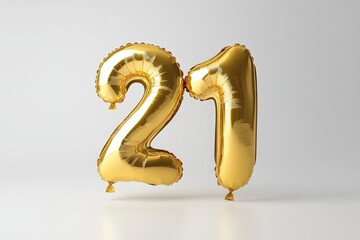 A shiny golden balloon shaped like the number 21, set against a neutral grey background. The balloon is slightly reflective, giving it a festive appearance.