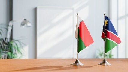 FLAGS OF MADAGASCAR AND NAMIBIA ON TABLE