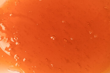 Red slime toy isolated background.