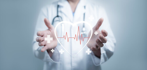 Medical worker hands protecting heart symbol with healthcare and medical cross symbol providing...