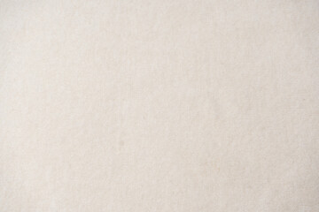 Beige sweater texture as a background.