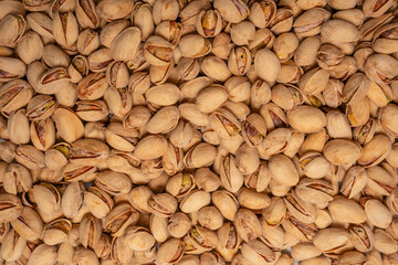 Tasty pistachios isolated on a white background.