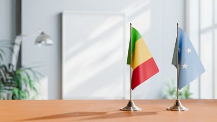 FLAGS OF MALI AND MICRONESIA ON TABLE