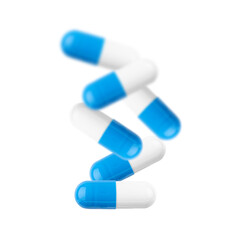 White and blu pill capsule isolated on a white background