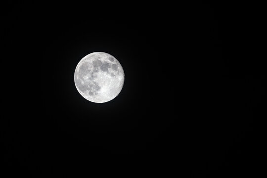 full moon against the black sky