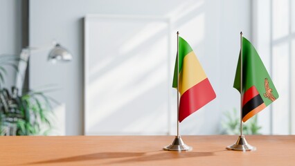 FLAGS OF MALI AND ZAMBIA ON TABLE