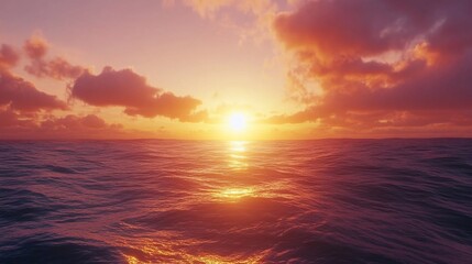 Fototapeta premium Vibrant sunset over calm ocean waters.