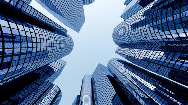 business and financial skyscraper buildings concept.Low angle view and lens flare of skyscrapers modern office building city in business center with blue sky.