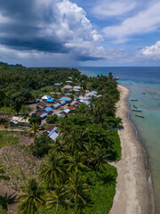 Naklejka premium Aerial View of Rumalusi Village in Teor Island, East Seram Regency, Maluku, Indonesia