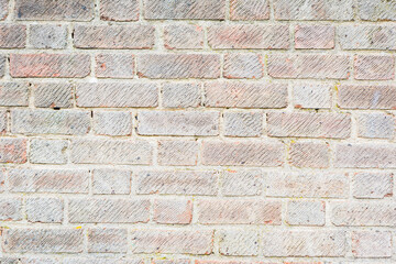 vintage brick wall texture, detailed texture of an old brick wall, showcasing the weathered and rustic appearance of vintage brickwork.