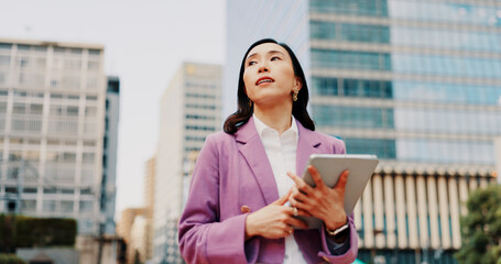 Japanese woman, city and tablet with thinking, below and planning in property or business. Female person, tech and ideas for growth, investment and opportunity in real estate development as architect