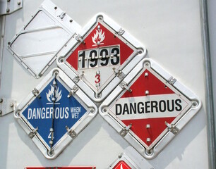 Hazmat placards on trailer door.  Scanned from film
source. Denoised,. Cropped. Resubmission.