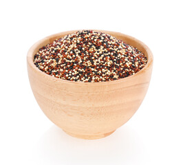 quinoa seeds in wooden bowl on white background.