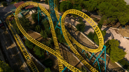 Aerial view of the iron structures of a roller coaster.