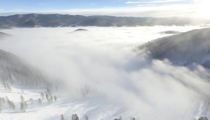 Obraz premium Snowy Mountain Scene with Cloud and Fog at High Altitude.