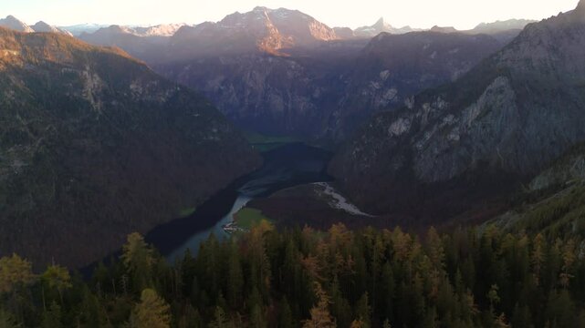 St. Bartholoma on Konigssee in Bavaria, Germany, is breathtaking landmark surrounded by Bavarian Alps aerial view of mountain viewpoint. Luftaufnahme St. Bartholoma Wallfahrtskirche Berchtesgadener. 