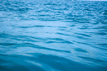 Fototapeta premium An abstract background of seawater flow under light exposure