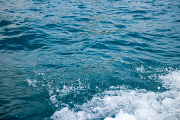 Fototapeta premium An abstract background of seawater flow under light exposure