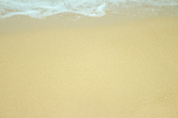 white beach sand texture background, footprints in the sand