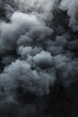 Obraz premium thick clouds of smoke on a black background