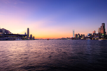 Breathtaking Sunset Over Victoria Harbour Featuring Traditional Chinese Sailing Boat, Hong Kong