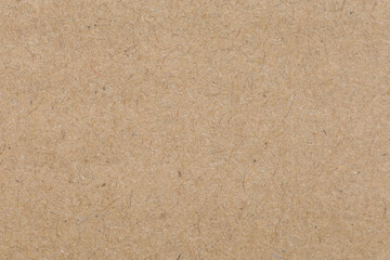 Close up of Old brown paper texture  visible. Paper fibers suitable for use as background images or decorations