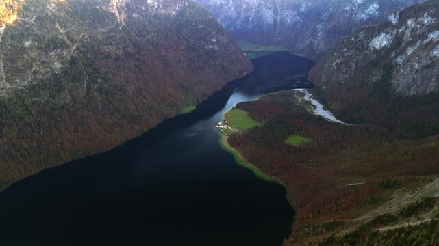 St. Bartholoma on Konigssee in Bavaria, Germany, is breathtaking landmark surrounded by Bavarian Alps aerial view of mountain viewpoint. Luftaufnahme St. Bartholoma Wallfahrtskirche Berchtesgadener. 