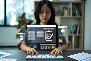 Hand typing on keyboard to download file from database server document management system in online documentation.