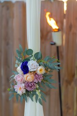 Floral Arrangement with Tiki Torch