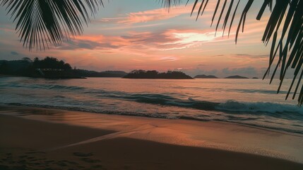 Serene beach sunset with palm trees framing the view