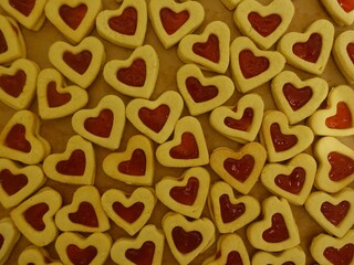 Heart-shaped cookies with red jelly