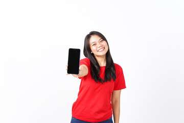 Naklejka premium Showing Apps or Ads On Blank Screen Smartphone Of Beautiful Asian Woman wearing red shirt Isolated On White Background