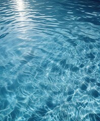 Obraz premium Blue sparkling swimming pool water with ripples, aqua, refreshing