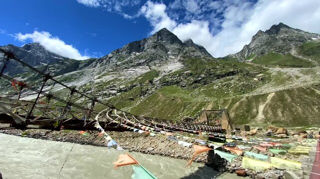 Chenab bridge in chhatru valley is a steel hanging bridge located midway in gramphu-batal-kaza road in chhatru, lahaul, himachal pradesh india