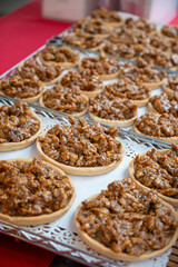 Walnuts tart cake form Perigord, Dordogne, fresh baked nuts cake on local farmers market in Saplat-du-Caneda, Perigord, France