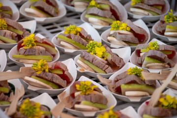 Degustation appetisers for visitors made by great chefs of haute cuisine French restaurants, wine festival in Tours, Loire valley, France