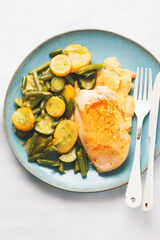 Grilled chicken breast with potato puree, courgette and beans