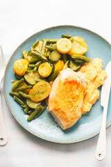 Grilled chicken breast with potato puree, courgette and beans