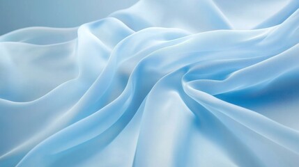 Obraz premium Delicate Light Blue Fabric Texture. A Stunning Display of Smooth, Flowing Fabric. Elegant and Subtle Pastel Blue Material. Perfect for Fashion or Design Inspiration.