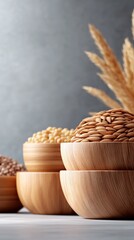 Various grains in wooden bowls on a table.