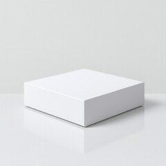Naklejka premium Food packaging box mock-up concept in a minimalist style. Blank white box on a reflective surface with minimalistic design
