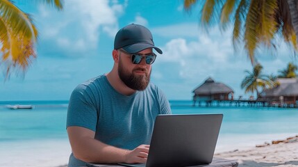 Fototapeta premium Relaxing Man Working on Laptop at Tropical Beach Under Palm Trees with Ocean and Bungalows in Background, Ideal for Remote Work Themes and Vacation Lifestyle Imagery
