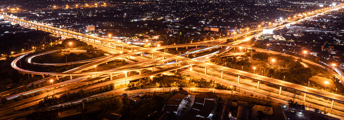 Expressway top view, Road traffic an important infrastructure, Drone aerial view fly in circle, traffic transportation, Public transport or commuter city life concept of economic and energ, transport.