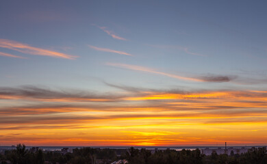 Fototapeta premium Bright and mysterious dawn, beautiful clouds on the horizon