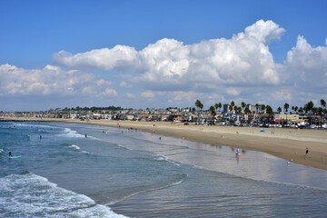 Newport Beach, CA, USA 10-04-2018 beach view with people and coastline, surfer, sand beach