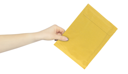 Cardboard package for document delivery, soft envelope, cardboard package, packaging paper letter in hand, outstretched hand with packaging paper letter isolated from background
