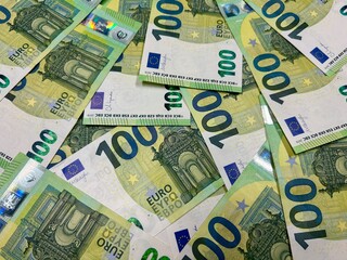 Euro banknotes background, hundred euro cash