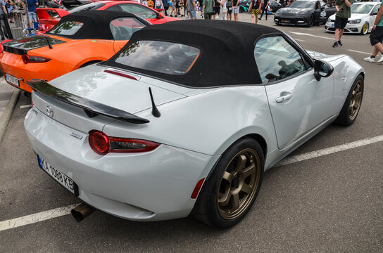 Sleek and agile roadster 2016 Mazda MX-5 known for its sporty design, featuring a lightweight chassis, and a stylish exterior, offers an unparalleled driving experience