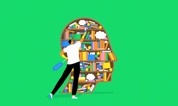 Man tidying bookshelf inside head