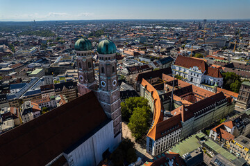 Beautiful aerial footage of Marienplatz the magestic New Town Hall, its clock and the Frauenkirche...